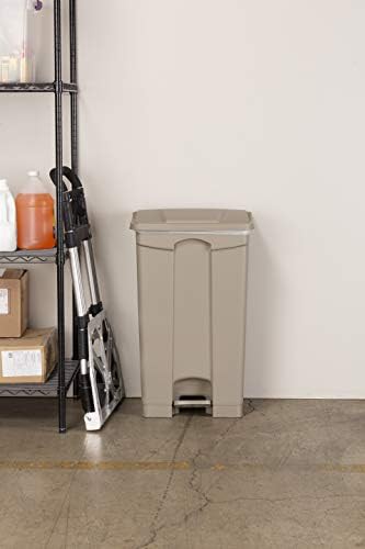 Tan plastic step on kitchen garbage can — photo 5